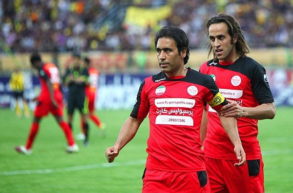 خداحافظی جادوگر و مهدوی کیا از فوتبال karimi-mahdavikia-88954