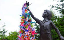 دختر ژاپنی که نماد صلح جهانی شد + عکس دختر ژاپنی که نماد صلح جهانی شد + عکس